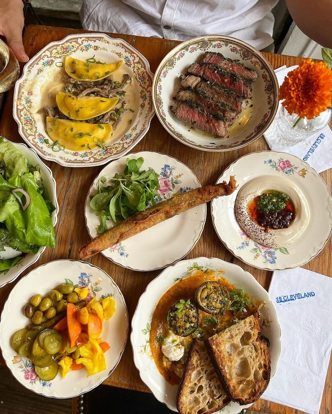 araffes and other dishes of food are on a table